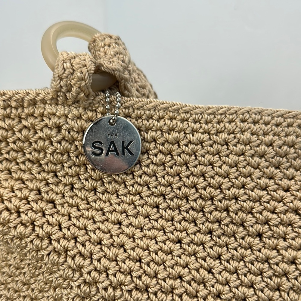 The Sak  crochet Tan Tote Bag with Purple Flower Accent - Picture 6 of 9
